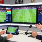 Football analysis scene featuring BK8 experts discussing Premier League highlights in a vibrant studio setting.